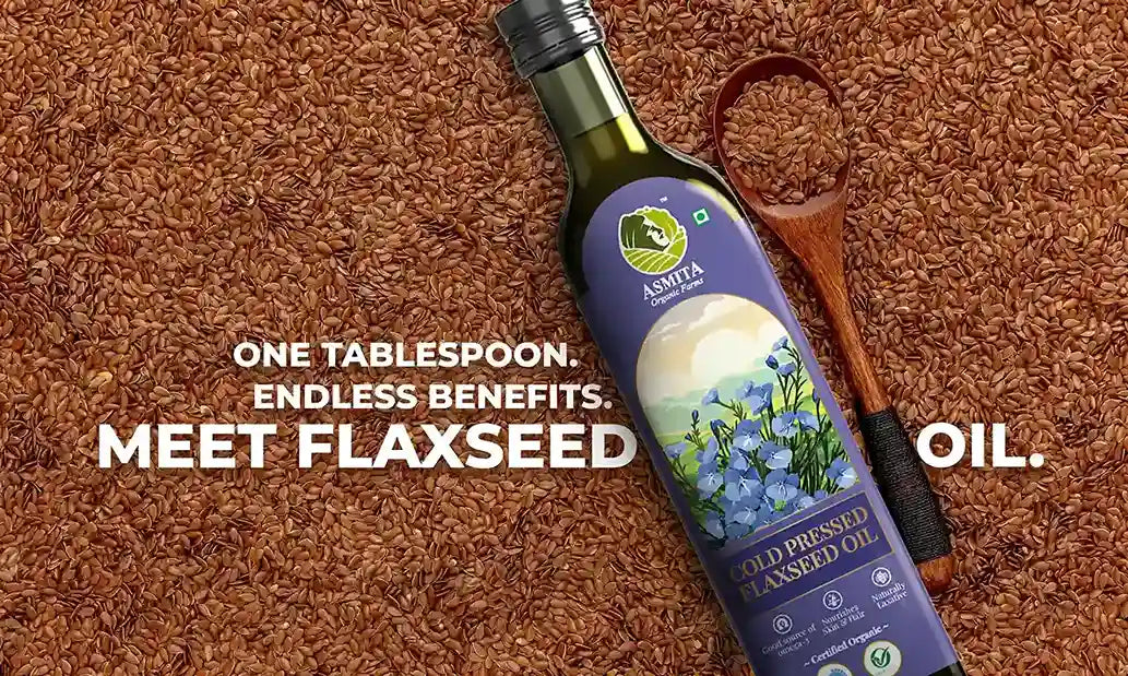 Asmita Organic Cold Pressed Flaxseed Oil bottle with a wooden spoon on a bed of flaxseeds — promotes plant-based nutrition with omega-3 benefits.
